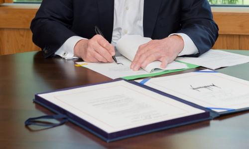 President Trump signing a bill