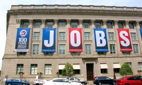 Banners spelling J-O-B-S hung by American Enterprise Institute