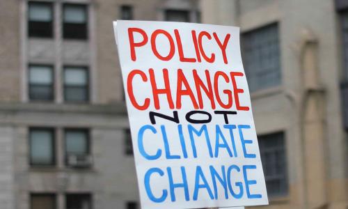 Sign saying Policy Change not Climate Change
