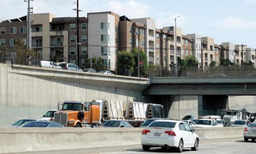 California freeway with housing complex above