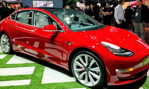 red Tesla EV at 2019 LA Auto Show